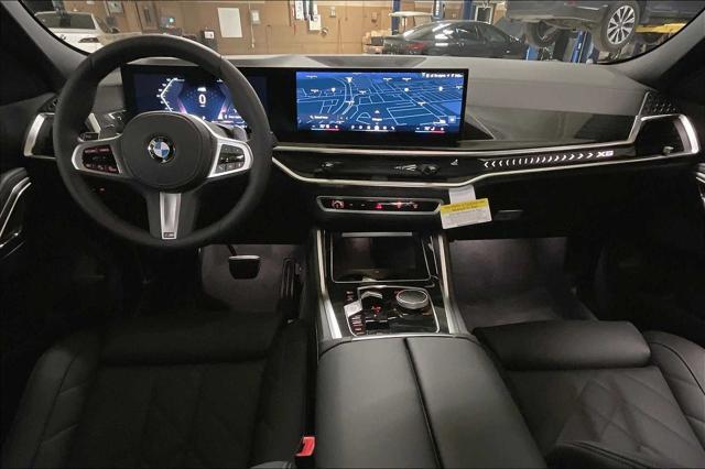 new 2025 BMW X6 car, priced at $77,875