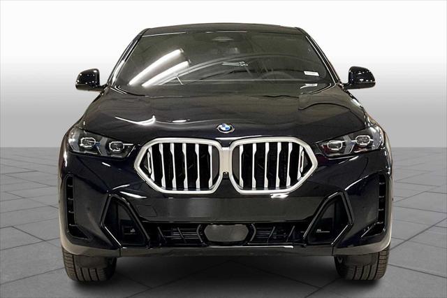 new 2025 BMW X6 car, priced at $77,875