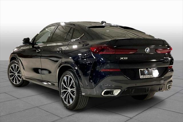 new 2025 BMW X6 car, priced at $77,875