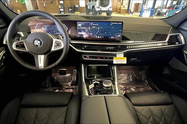 new 2025 BMW X6 car, priced at $89,405