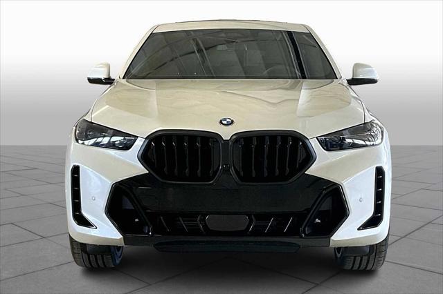 new 2025 BMW X6 car, priced at $89,405