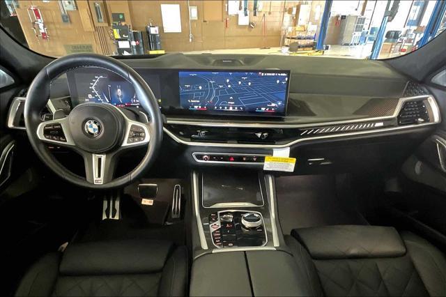 used 2024 BMW X6 car, priced at $87,903