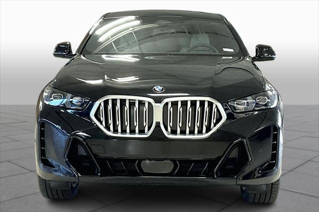 new 2025 BMW X6 car, priced at $77,875