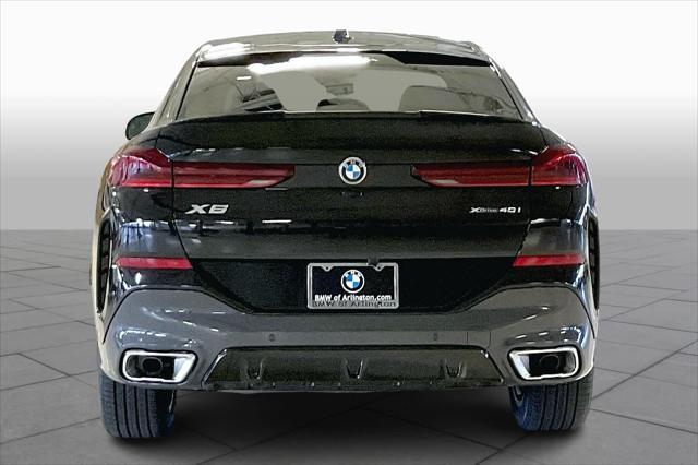 new 2025 BMW X6 car, priced at $77,875