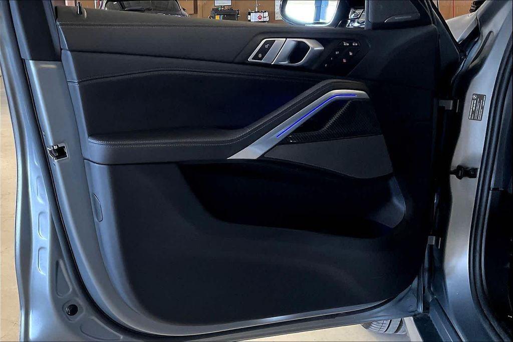 used 2025 BMW X6 car, priced at $89,691