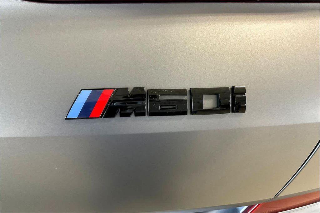 used 2025 BMW X6 car, priced at $89,691
