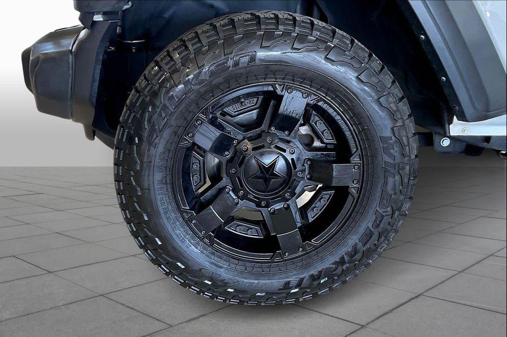 used 2023 Jeep Wrangler car, priced at $28,481
