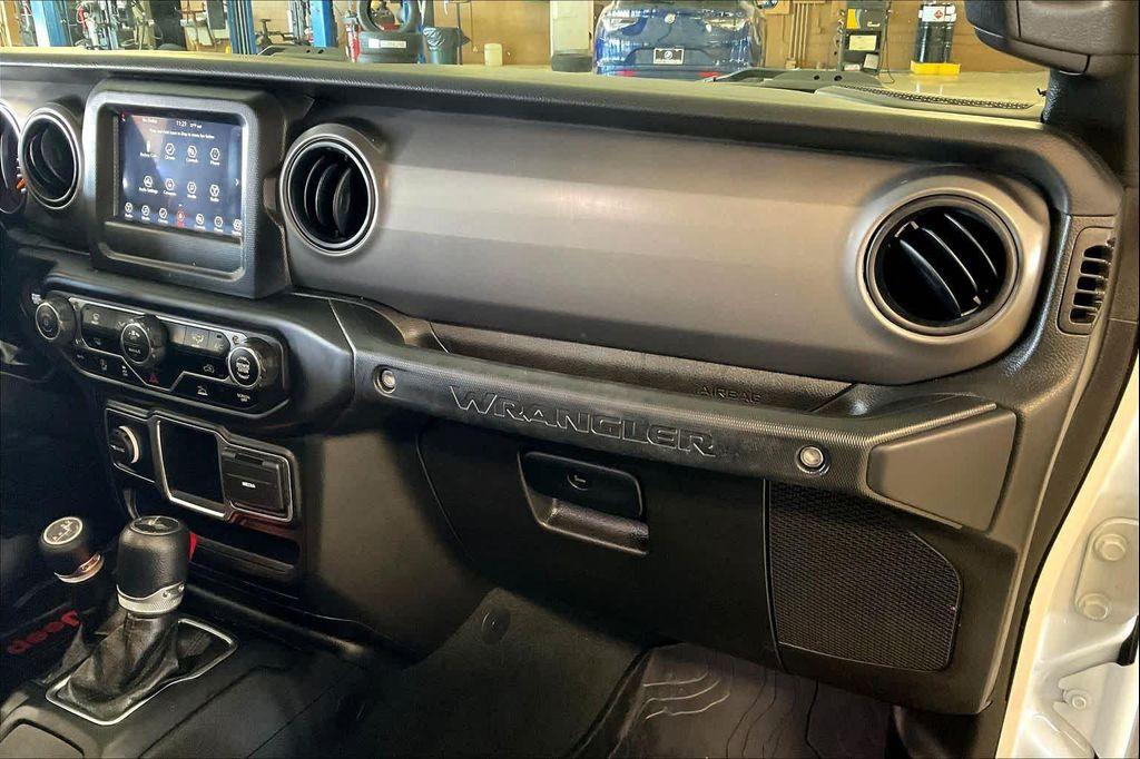 used 2023 Jeep Wrangler car, priced at $28,481