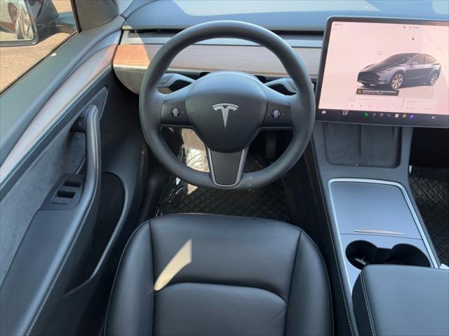 used 2024 Tesla Model Y car, priced at $36,550
