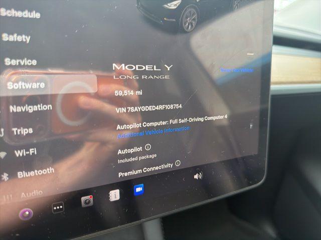 used 2024 Tesla Model Y car, priced at $32,133