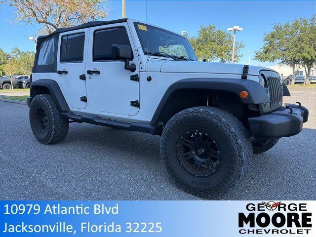 used 2015 Jeep Wrangler Unlimited car, priced at $18,686