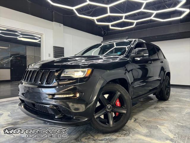 used 2014 Jeep Grand Cherokee car, priced at $27,900