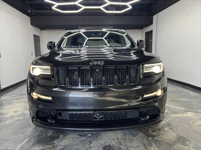 used 2014 Jeep Grand Cherokee car, priced at $27,900