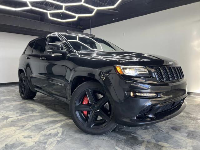 used 2014 Jeep Grand Cherokee car, priced at $27,900