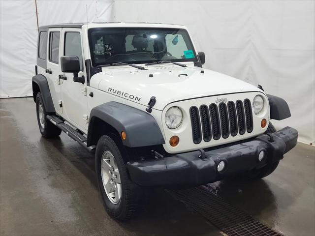 used 2010 Jeep Wrangler Unlimited car, priced at $15,995