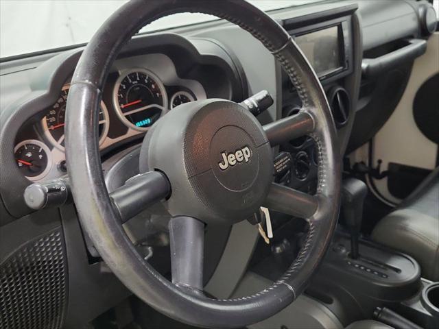 used 2010 Jeep Wrangler Unlimited car, priced at $15,995