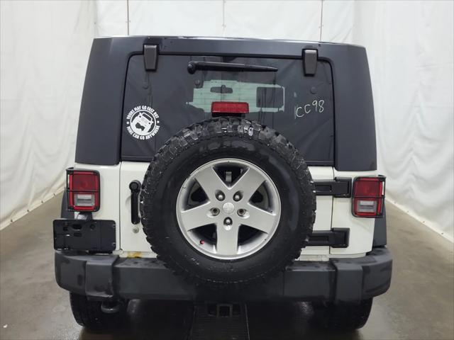 used 2010 Jeep Wrangler Unlimited car, priced at $15,995