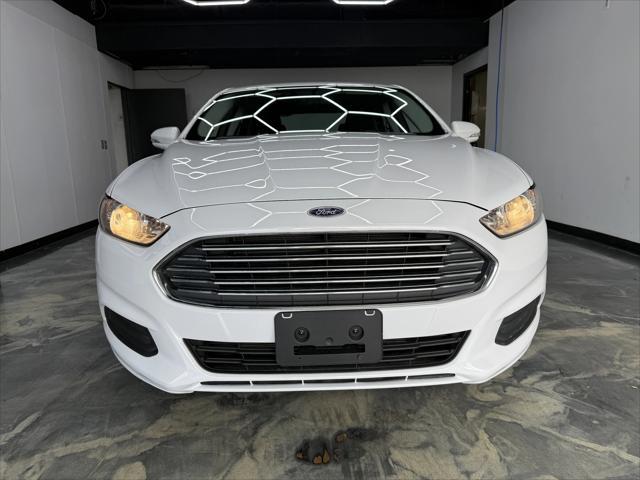 used 2015 Ford Fusion car, priced at $8,900
