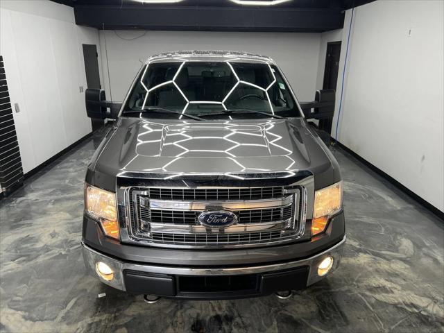 used 2014 Ford F-150 car, priced at $13,900