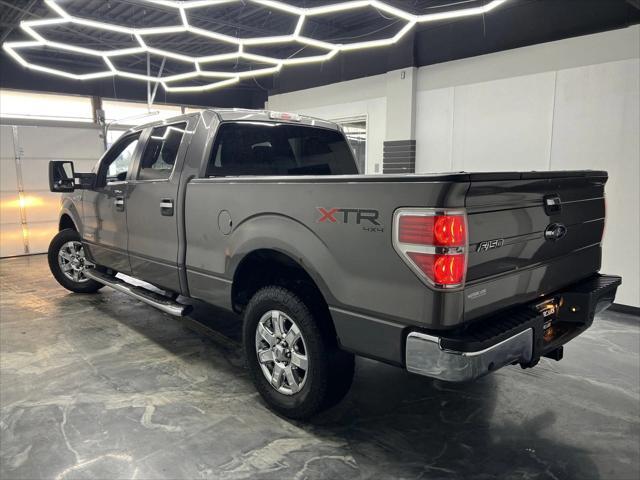 used 2014 Ford F-150 car, priced at $13,900