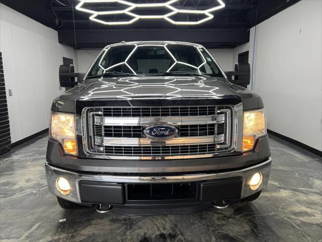 used 2014 Ford F-150 car, priced at $13,900