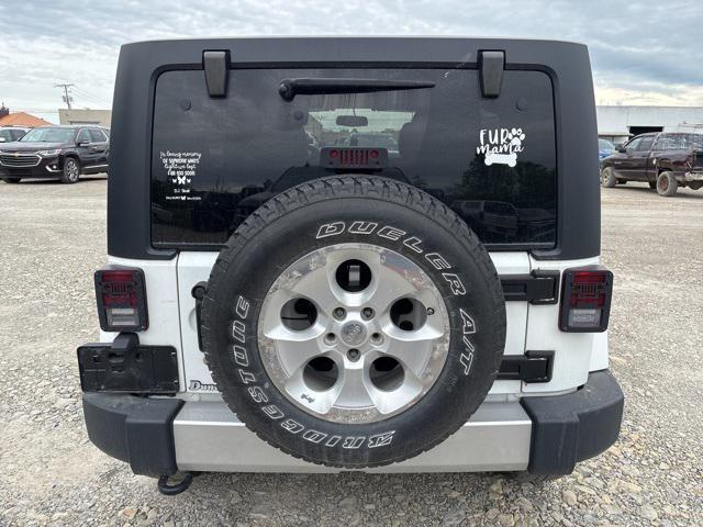 used 2014 Jeep Wrangler Unlimited car, priced at $14,729