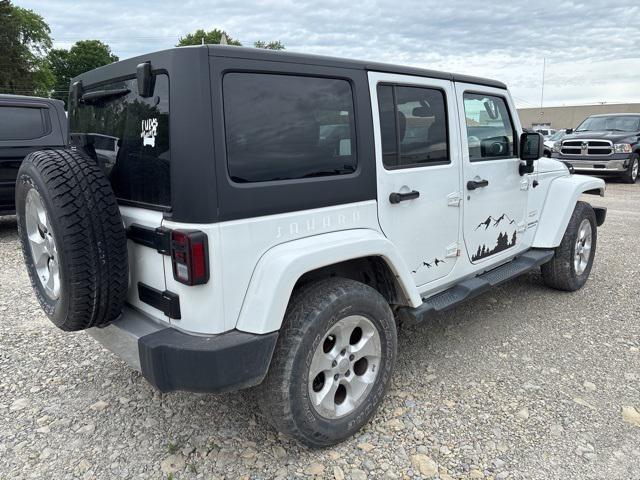 used 2014 Jeep Wrangler Unlimited car, priced at $14,729
