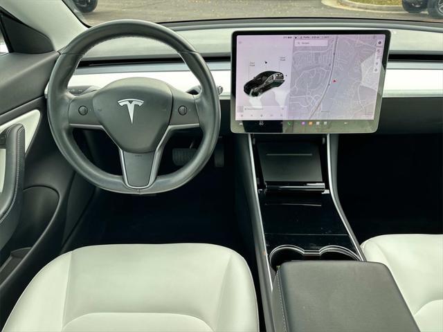 used 2018 Tesla Model 3 car, priced at $23,500