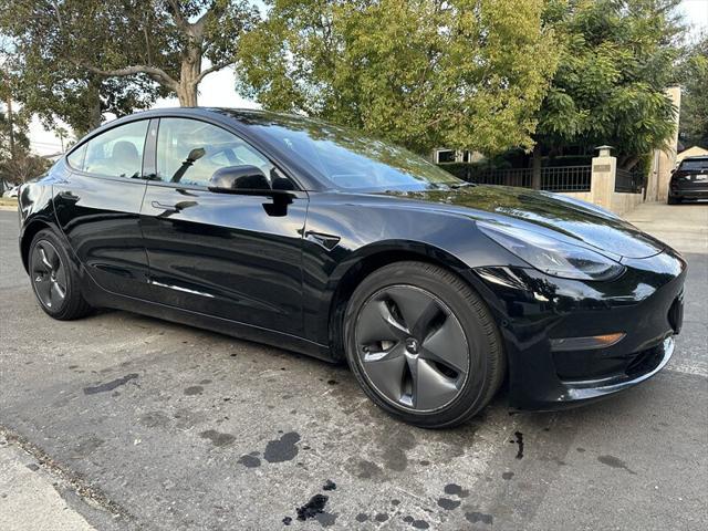 used 2022 Tesla Model 3 car, priced at $15,990