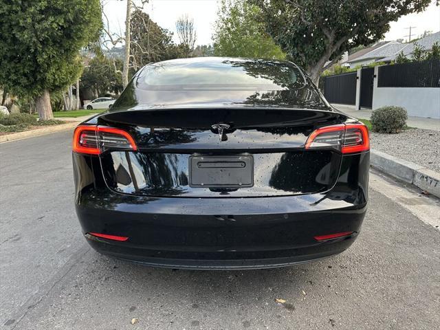 used 2022 Tesla Model 3 car, priced at $15,990