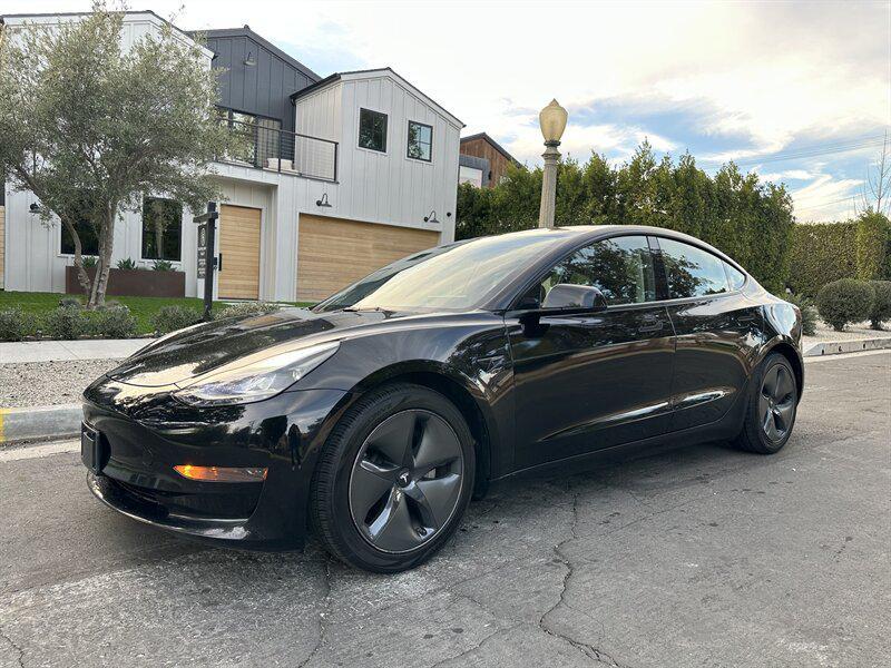 used 2022 Tesla Model 3 car, priced at $17,995