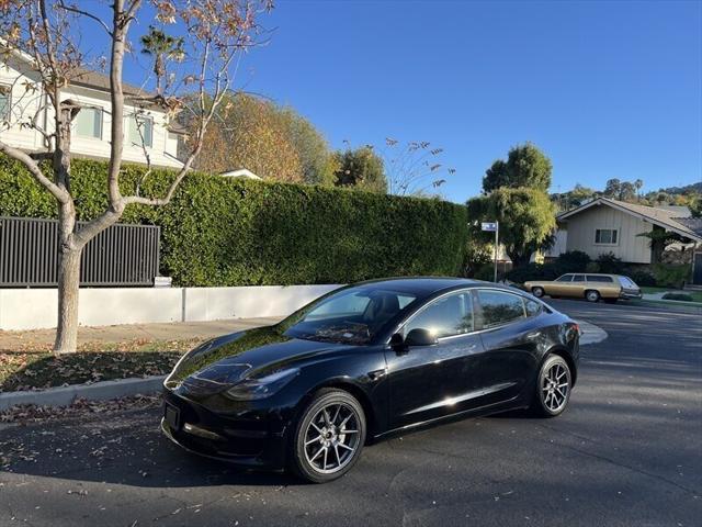 used 2022 Tesla Model 3 car, priced at $17,995