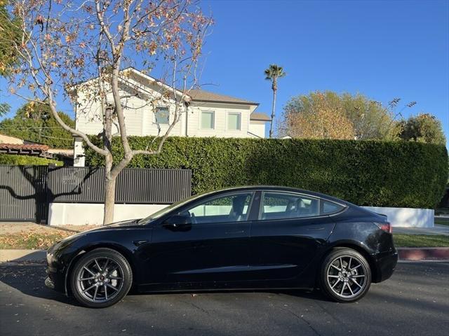 used 2022 Tesla Model 3 car, priced at $17,995