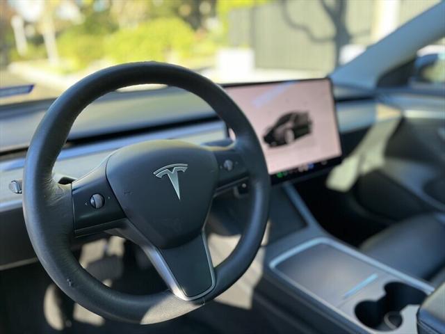 used 2022 Tesla Model 3 car, priced at $17,995