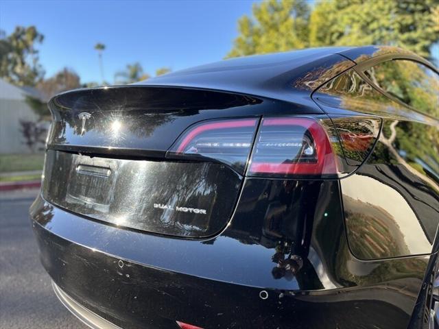 used 2022 Tesla Model 3 car, priced at $17,995