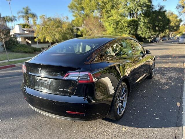 used 2022 Tesla Model 3 car, priced at $17,995