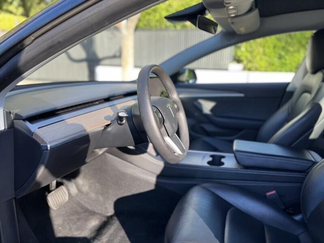 used 2022 Tesla Model 3 car, priced at $17,995