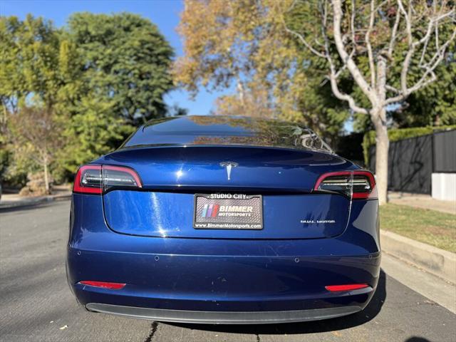 used 2022 Tesla Model 3 car, priced at $15,995