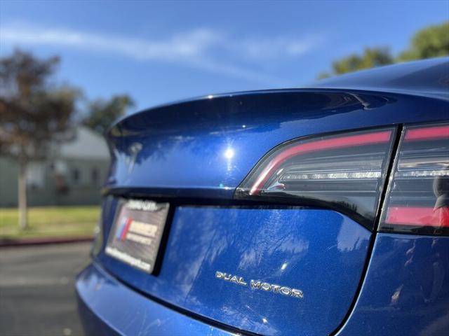 used 2022 Tesla Model 3 car, priced at $15,995