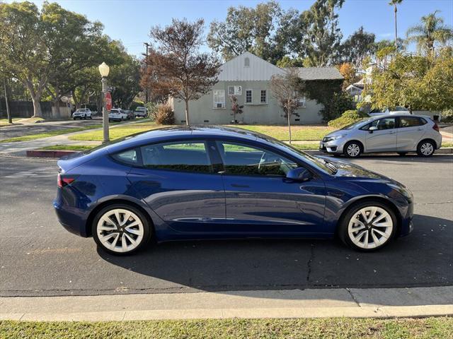 used 2022 Tesla Model 3 car, priced at $15,995