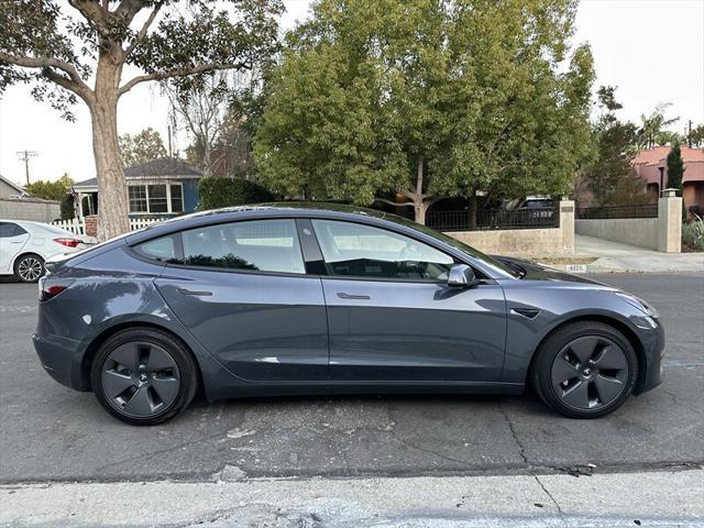 used 2022 Tesla Model 3 car, priced at $19,995