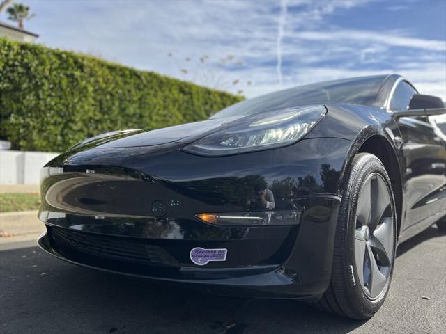 used 2019 Tesla Model 3 car, priced at $13,995