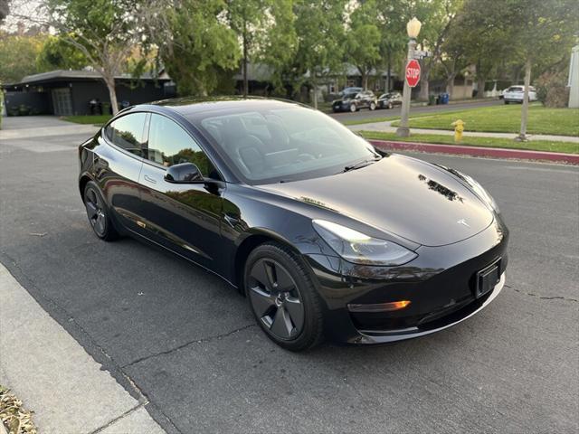 used 2022 Tesla Model 3 car, priced at $17,995