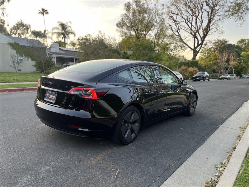 used 2022 Tesla Model 3 car, priced at $17,995