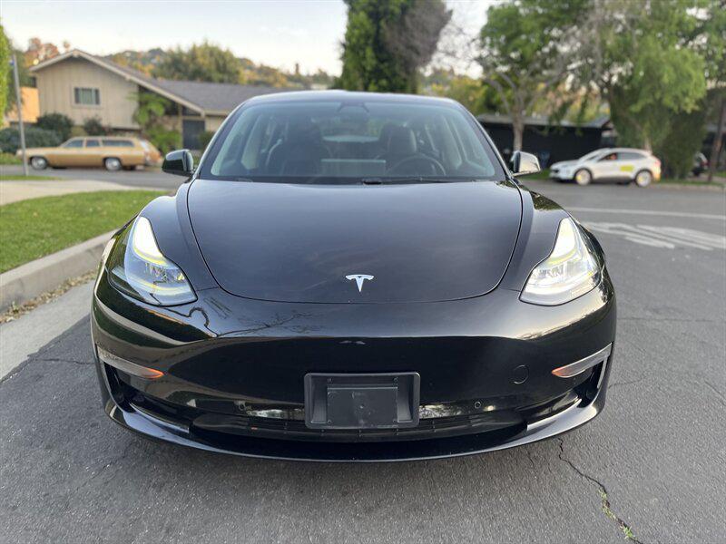 used 2022 Tesla Model 3 car, priced at $17,995
