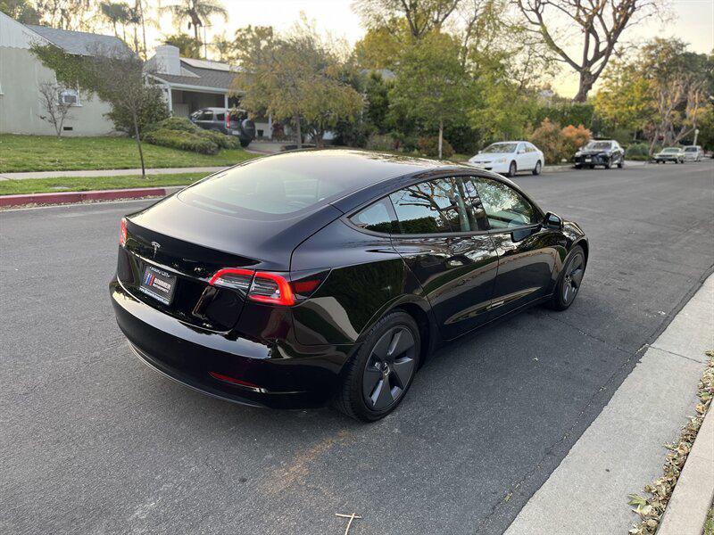 used 2022 Tesla Model 3 car, priced at $17,995