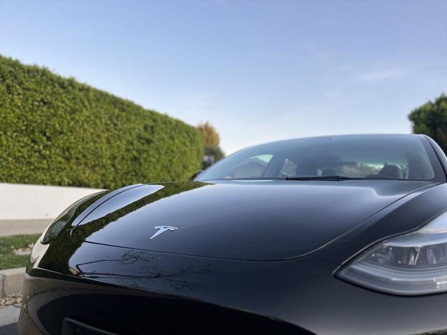 used 2022 Tesla Model 3 car, priced at $17,995