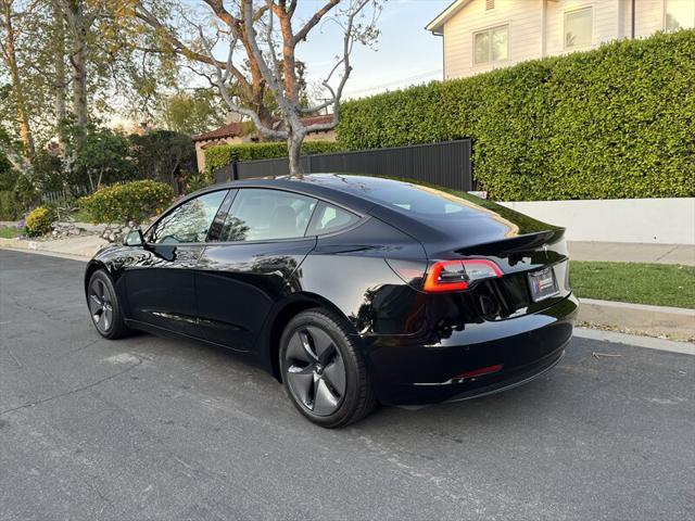 used 2022 Tesla Model 3 car, priced at $17,995