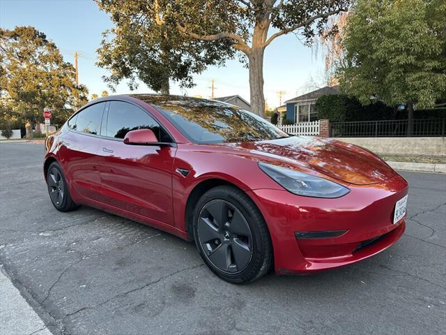 used 2022 Tesla Model 3 car, priced at $16,995