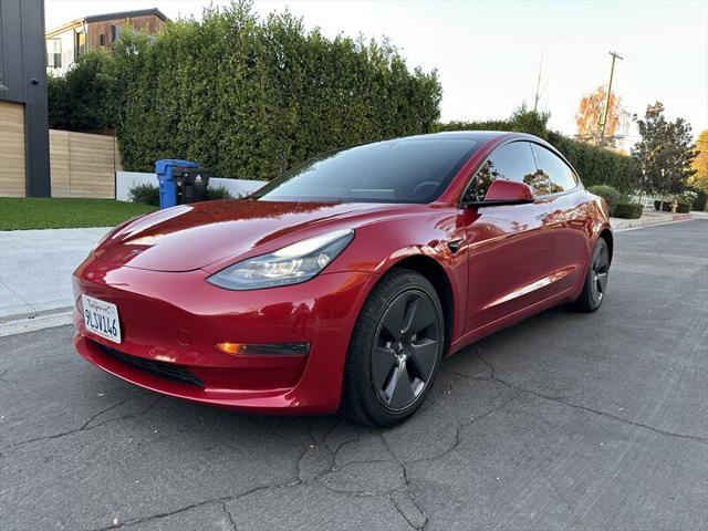 used 2022 Tesla Model 3 car, priced at $16,995